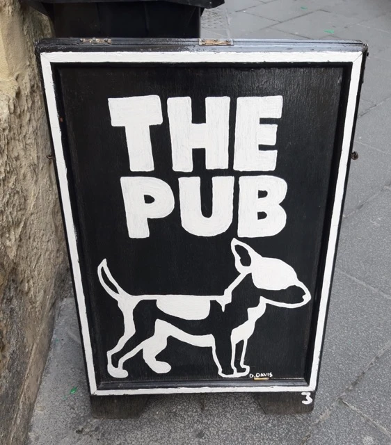 Photo of The Pub's board.